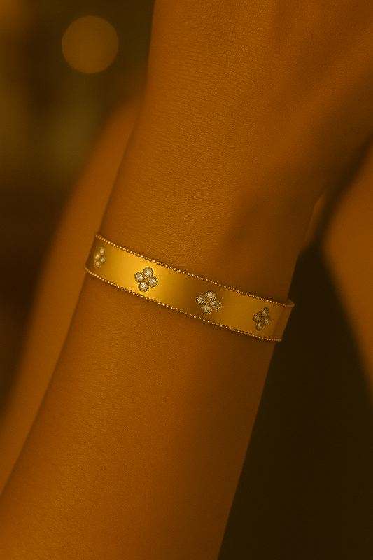 18k gold plated floral bangle bracelet with beaded edges and crystal motifs by Juwelenn – elegant gold bracelet for women
