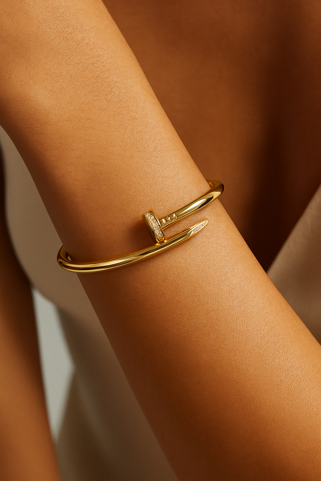 18k gold plated nail twist cuff bracelet with crystal accents on stainless steel by Juwelenn – modern sculptural gold bracelet for women