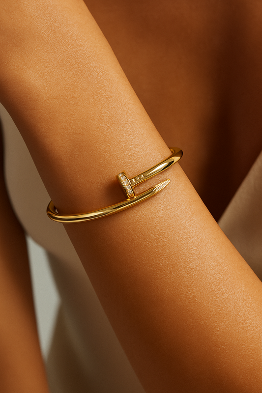 18k gold plated nail twist cuff bracelet with crystal accents on stainless steel by Juwelenn – modern sculptural gold bracelet for women